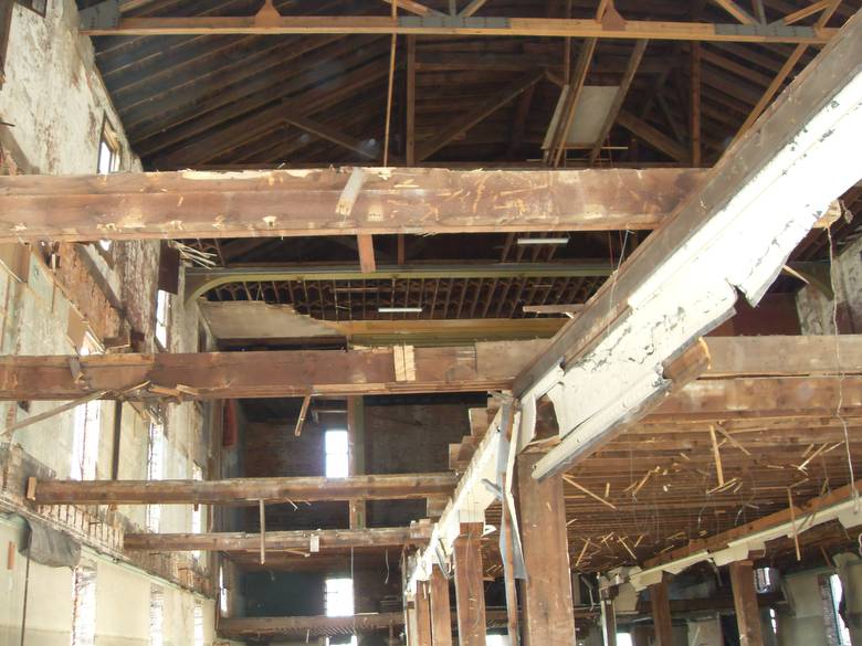 Opera House Main Floor Deconstruction / This photo shows the main floor joists from the ground floor looking up