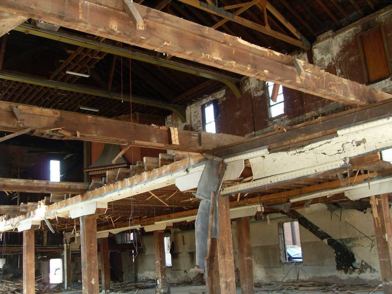 Opera House Main Floor Deconstruction / This photo shows the main floor joists from the ground floor looking up