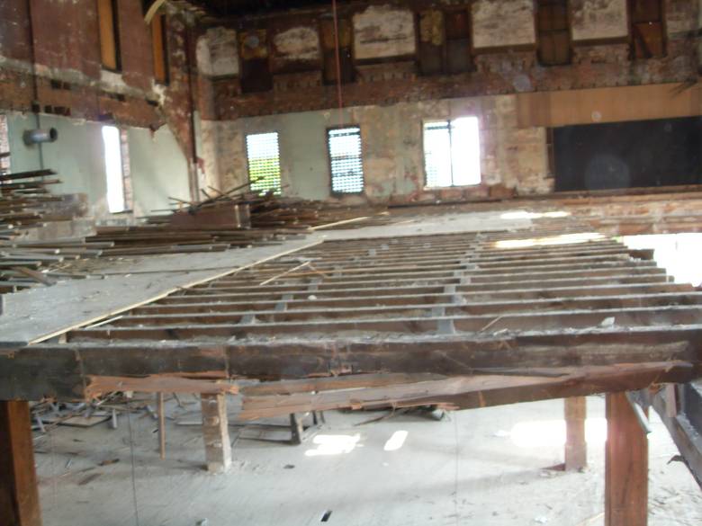 Opera House Main Floor Deconstruction / Main Floor joists (view from stage--notice the shadow of the balcony)