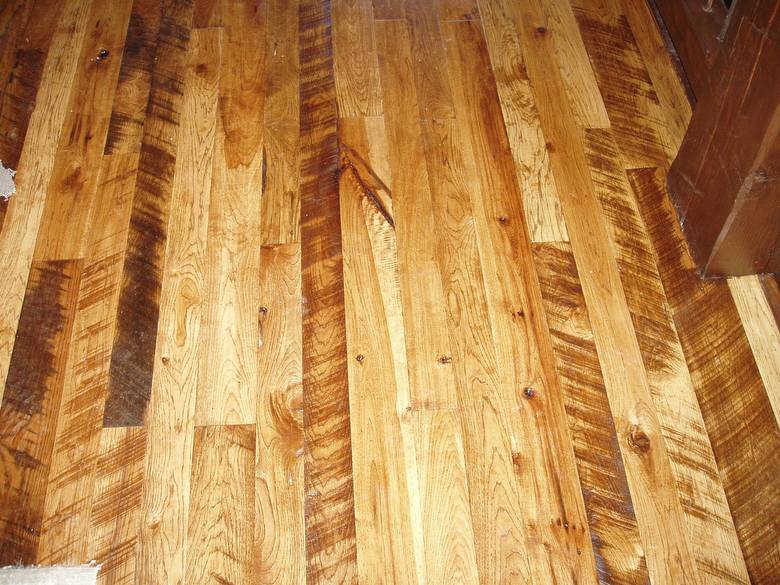 Rescued Skip-Planed Hickory T&G Random  Width  / Finished With Fruit Wood Stain & Old Master Poly
