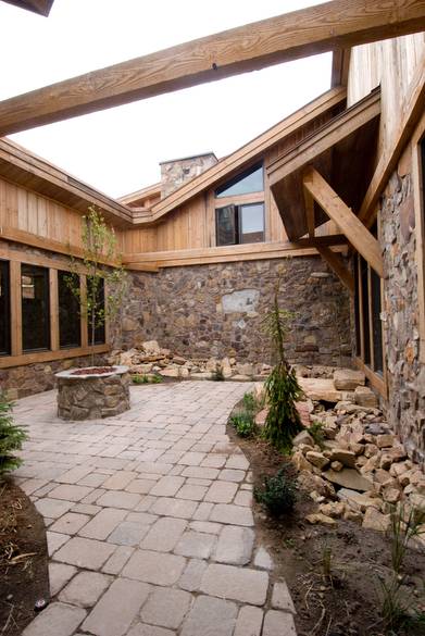 Inside Courtyard / Trestlewood II "Salty Fir" Circle-Sawn Siding & Trim