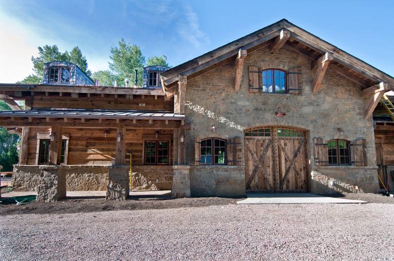 Hand-Hewn & Weathered timbers, 1x12 wedgelap with rabbit joint weathered siding and barnwood doors