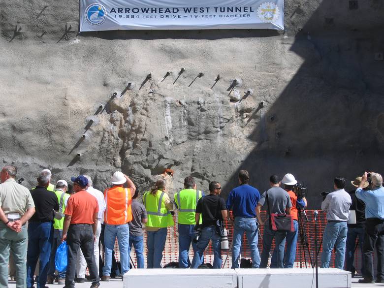 Tunnel Boring Machine breaking through a mountain face to finish Arrowhead Tunnel Project
