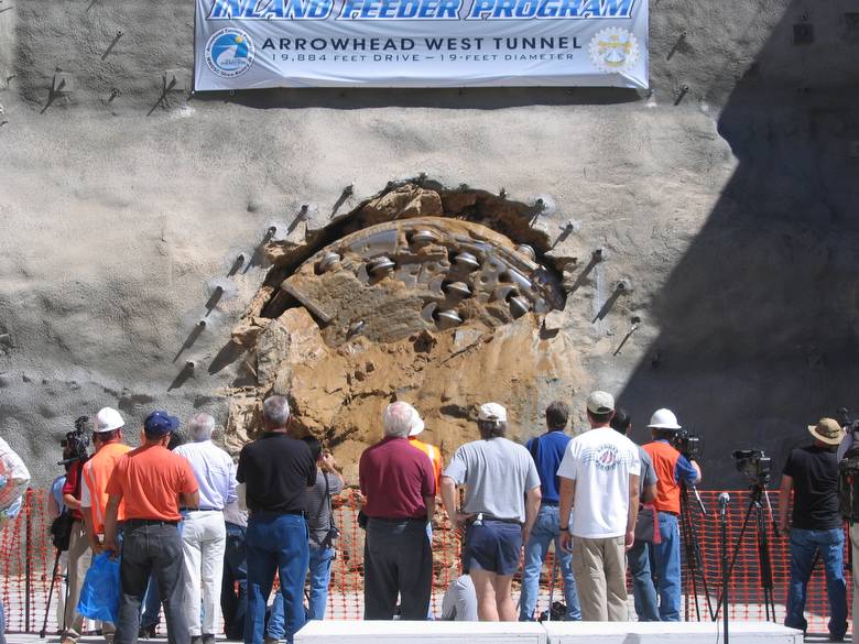 Tunnel Boring Machine breaking through a mountain face to finish Arrowhead Tunnel Project