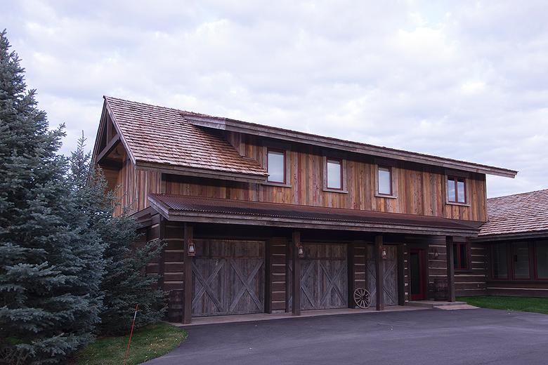 Exterior:  Antique Barnwood Siding and Garage Doors