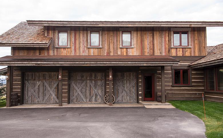 Exterior:  Antique Barnwood Siding and Garage Doors