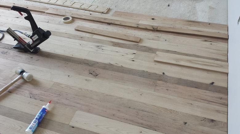 Nailing and gluing flooring