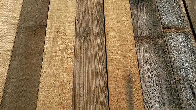 Photo shows part of the boards with the weathered face and part with the band-sawn face
