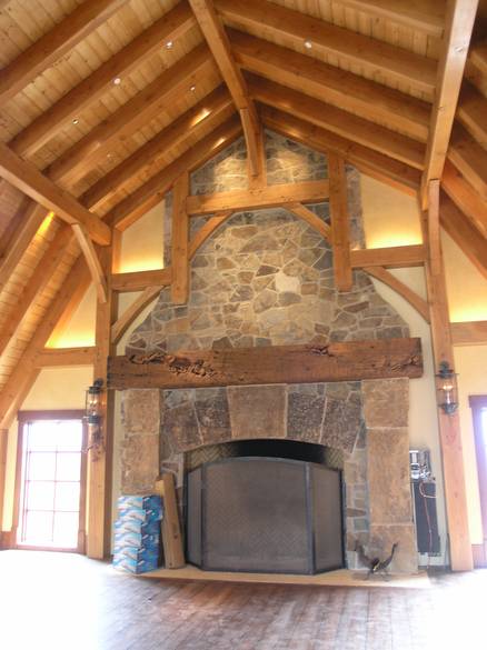 Timber mantel in great room / Douglas Fir 22x22 detail-carved
