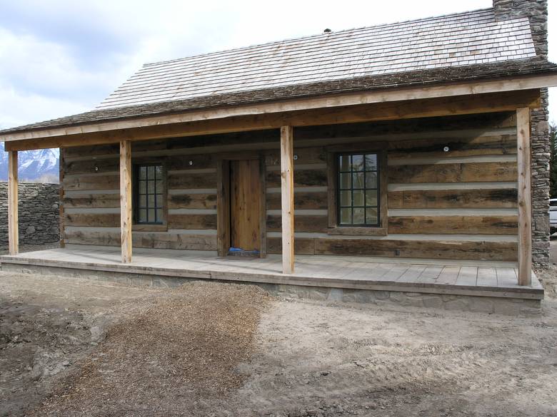 Motorcyle barn - weathered siding / 6x14 timber siding with chinking inbetween