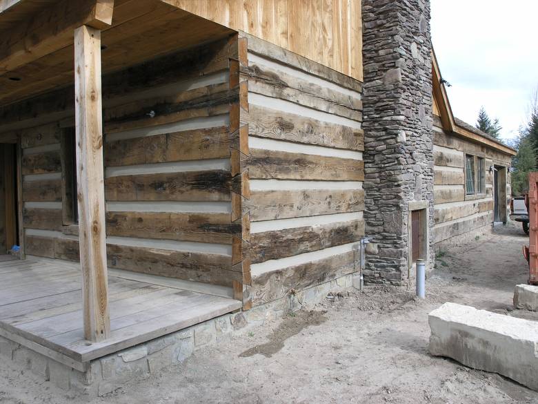 Weathered timber siding with chinking / dovetailed corners