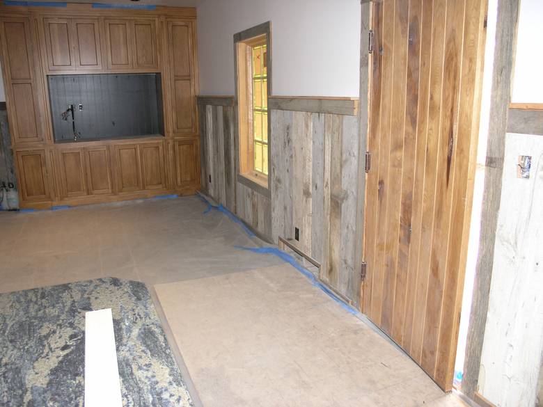 interior of motorcycle barn / weathered mixed grey and brown barnwood