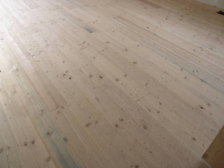 TWII circle-sawn flooring / unfinished in the guest loft