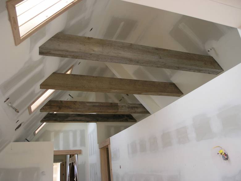 weathered beams / timbers / guest loft in the vaulted ceiling