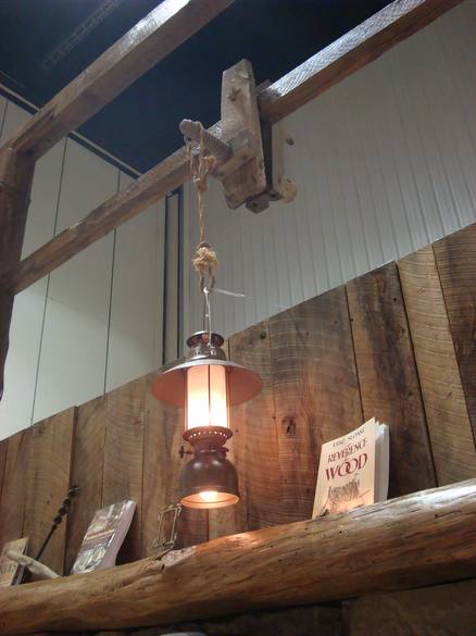 Close-up of lantern light and old wood vice / Also shows the sleeper mantel used